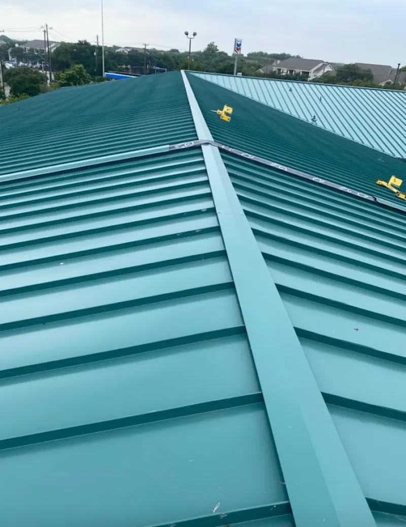 Green commercial metal roof ridge and valley for Metal Roof Repair in Daly City